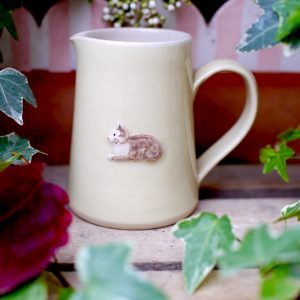 Small, Pale Yellow Jane Hogben Jug featuring a lovely little cat.