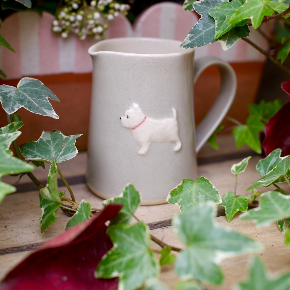 Small, taupe Jane Hogben Jug featuring a charming little Westie design.