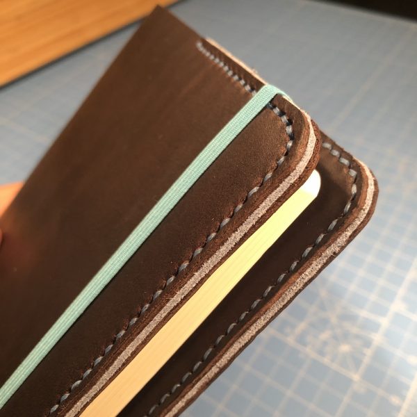 Journal & Hide A5 Journal Cover: Chocolate leather, Powder Blue Stitching. Powder Blue Suede Sandwich. Ice Blue Leuchtturm Notebook.